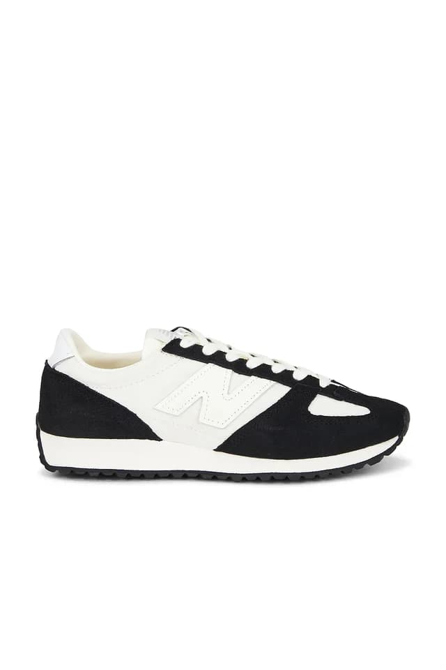 New Balance 471 Sneaker in Black, image 1 of 1 from FWRD