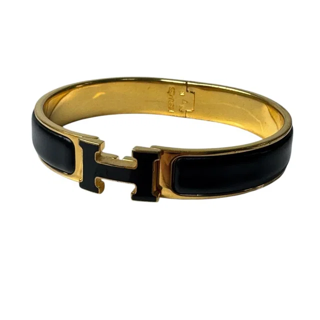Hermès Clic Clac Bracelet Black Gold in Black from The Reluxe, photo 1 of 1