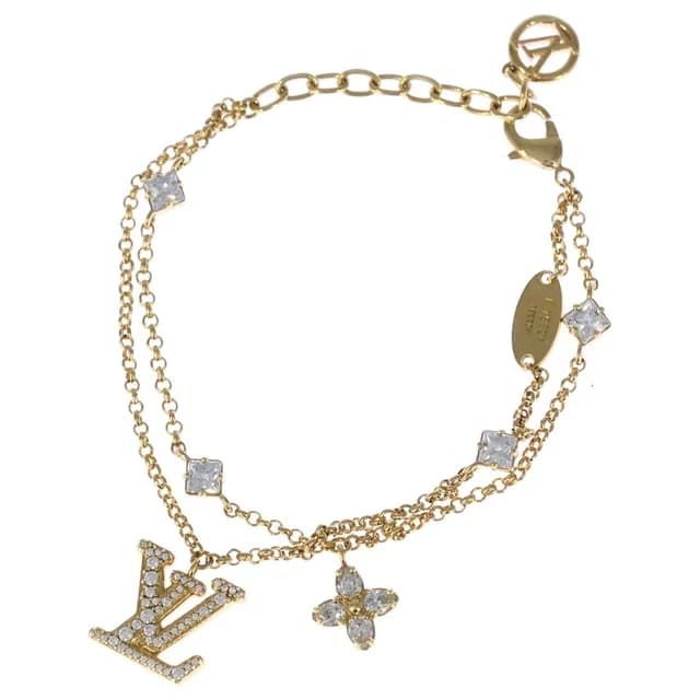 Bracelet LV Logo Charm Gold in Gold from The Reluxe, photo 1 of 1