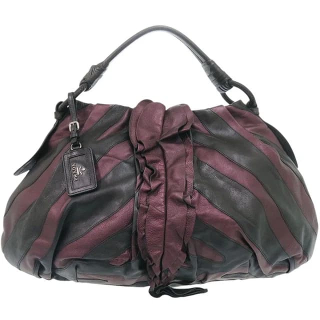 Prada Vitellino Mordo Leather Purple Black Handbag in Black Leather from The Reluxe, photo 1 of 1