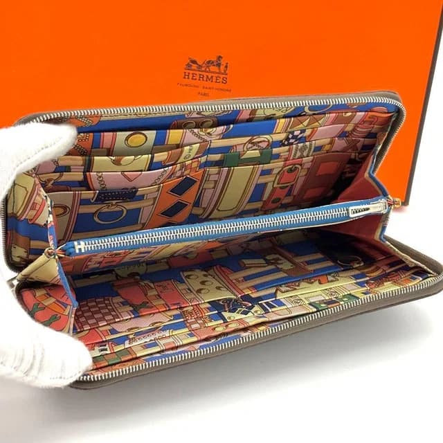 Hermès Wallet Azap Long Silk'in Etoupe Greige in Taupe Silk from The Reluxe, photo 1 of 1