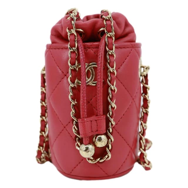 Chanel CC Micro Quilted Lambskin Leather Drawstring Bucket Bag Red in Red Lambskin from Dallas Designer Handbags, photo 1 of 1