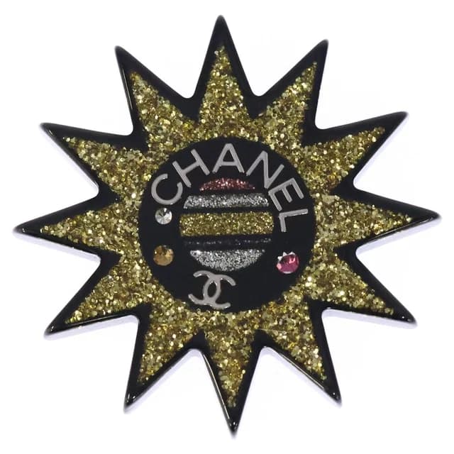 Chanel Sun Motif Rhinestone Brooch Pin Badge Black Yellow Resin Strass in Black Resin from The Reluxe, photo 1 of 1