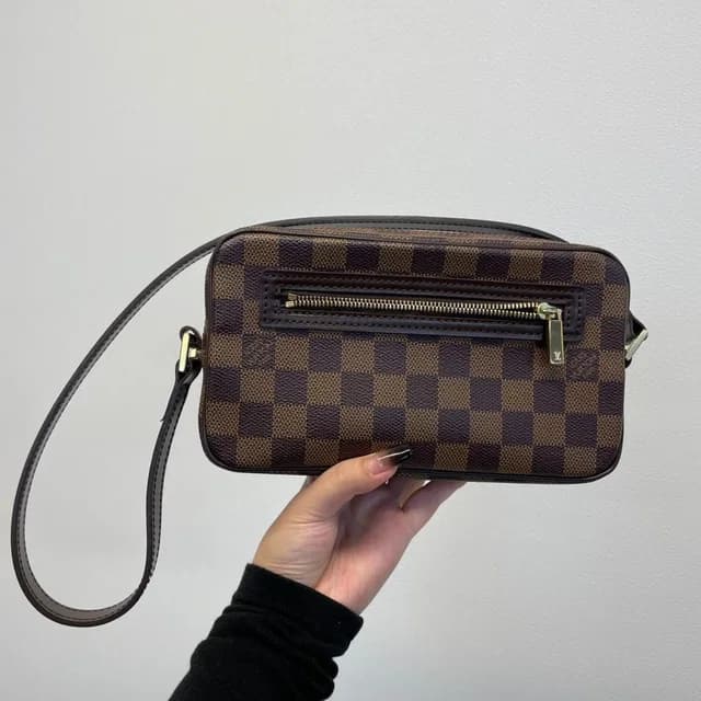 Louis Vuitton Pochette Cite Shoulder Bag in Coated canvas from The Reluxe, photo 1 of 1