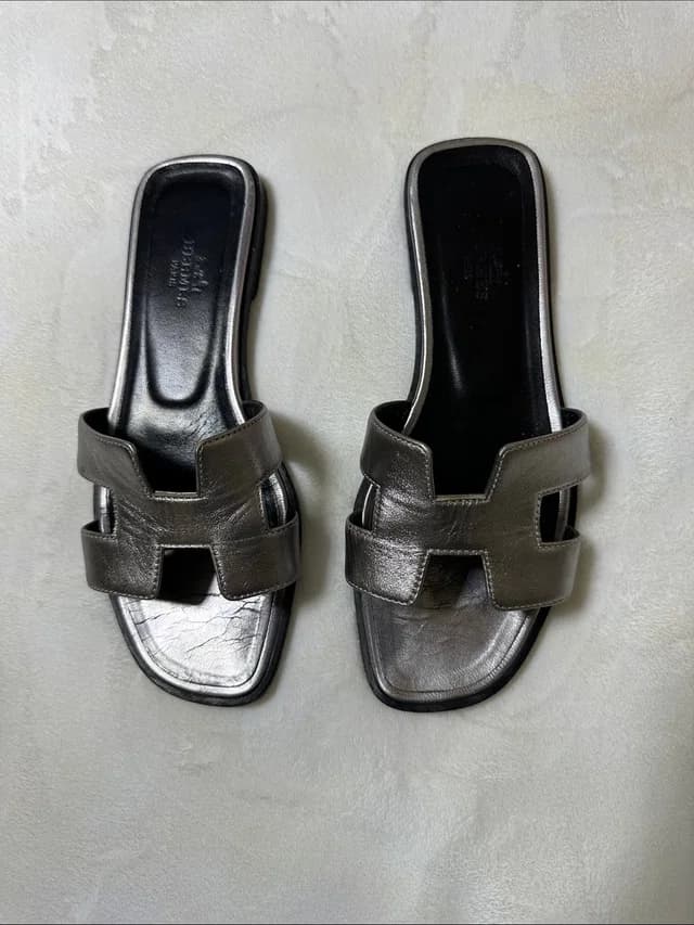 Hermès Oran Slides in silver|gray from Poshmark, photo 1 of 1