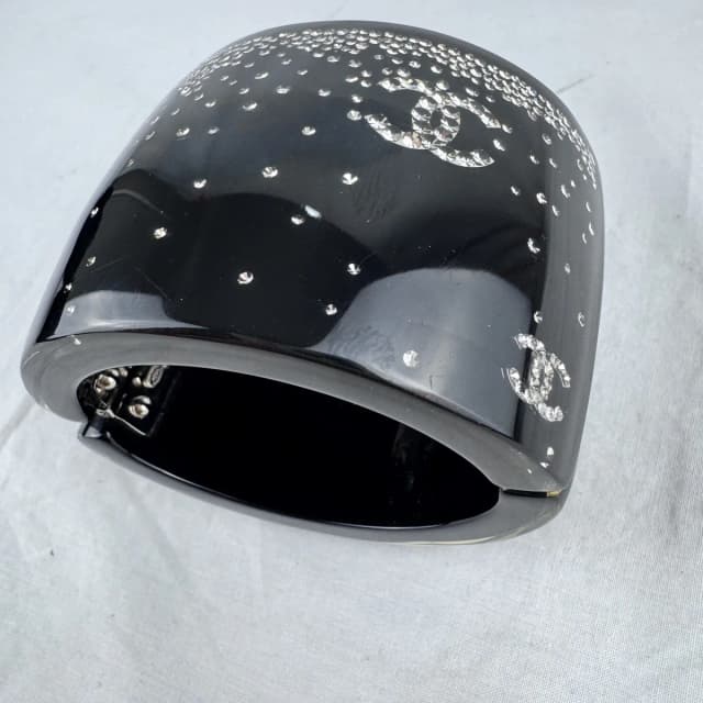 Chanel CC Strass Black Resin 2” Wide Cuff Bracelet in Black Crystal, resin, strass from Reowned, photo 1 of 1