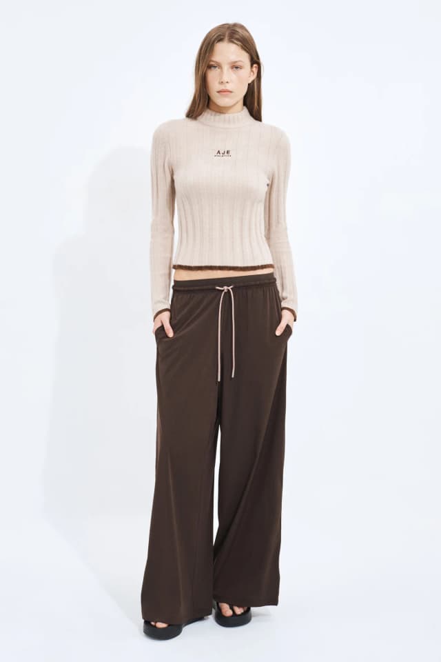 Athletica Mock Neck Rib Knit Top in NOUGAT, image 1 of 1 from Aje