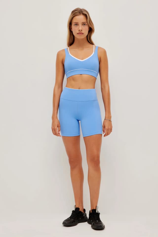 Athletica Contrast Mid Length Bike Short 601 in SKY, image 1 of 1 from Aje