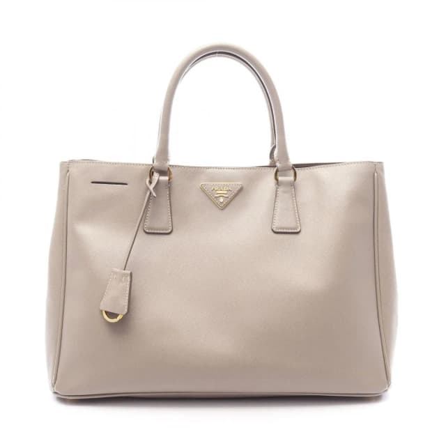 Prada Tote Saffiano Lux Galleria Greige Leather Triangle Logo 2-Way in Taupe Saffiano leather from The Reluxe, photo 1 of 1