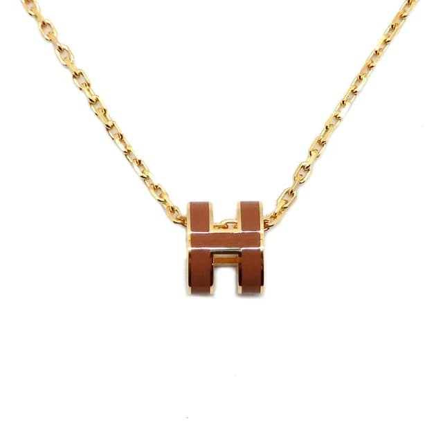 Hermès Necklace Mini Pop H Rocabar New Gold Yellow H Logo Pendant in Yellow from The Reluxe, photo 1 of 1