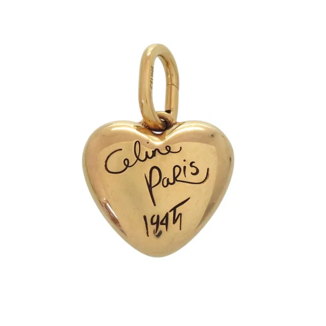 Celine Charm Heart Aluminum Gold Pendant in Gold from The Reluxe, photo 1 of 1