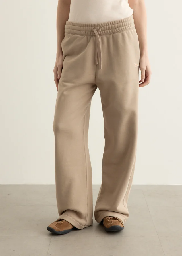 Maison Kitsune Baby Fox Relaxed Jog Pants in FEATHER BEIGE, image 1 of 1 from Incu
