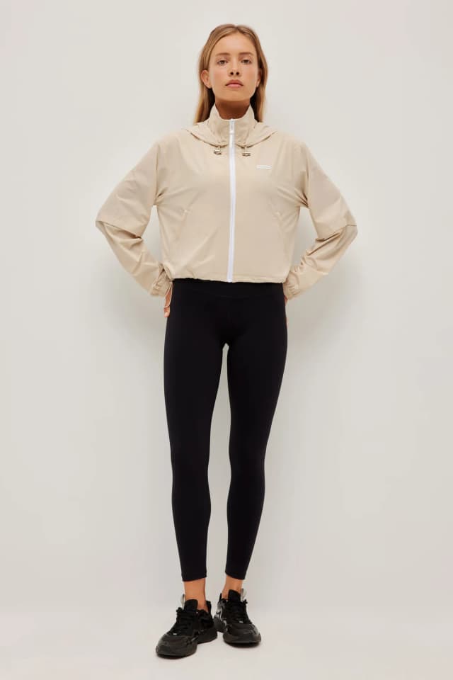 Athletica Hooded Running Jacket 716 in COOL STONE, image 1 of 1 from Aje