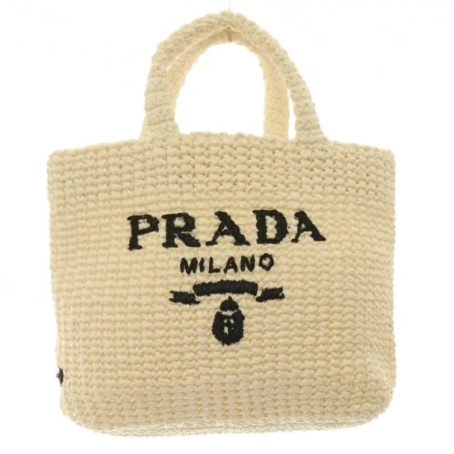 Prada Handbag Raffia Logo Braid Bicolor Triangle Plate White Black in Black Raffia from The Reluxe, photo 1 of 1