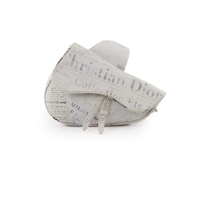 Christina Dior x Daniel Arsham Men's Newspaper Print Saddle Bag White in White Leather from The Purse Affair, photo 1 of 1
