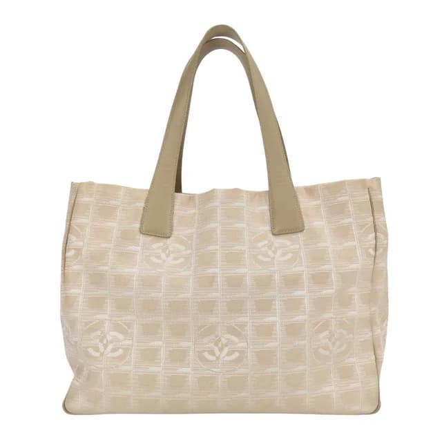 Chanel Handbag New Travel Line PM Jacquard Nylon Beige CC Logo Daily in Beige Nylon from The Reluxe, photo 1 of 1