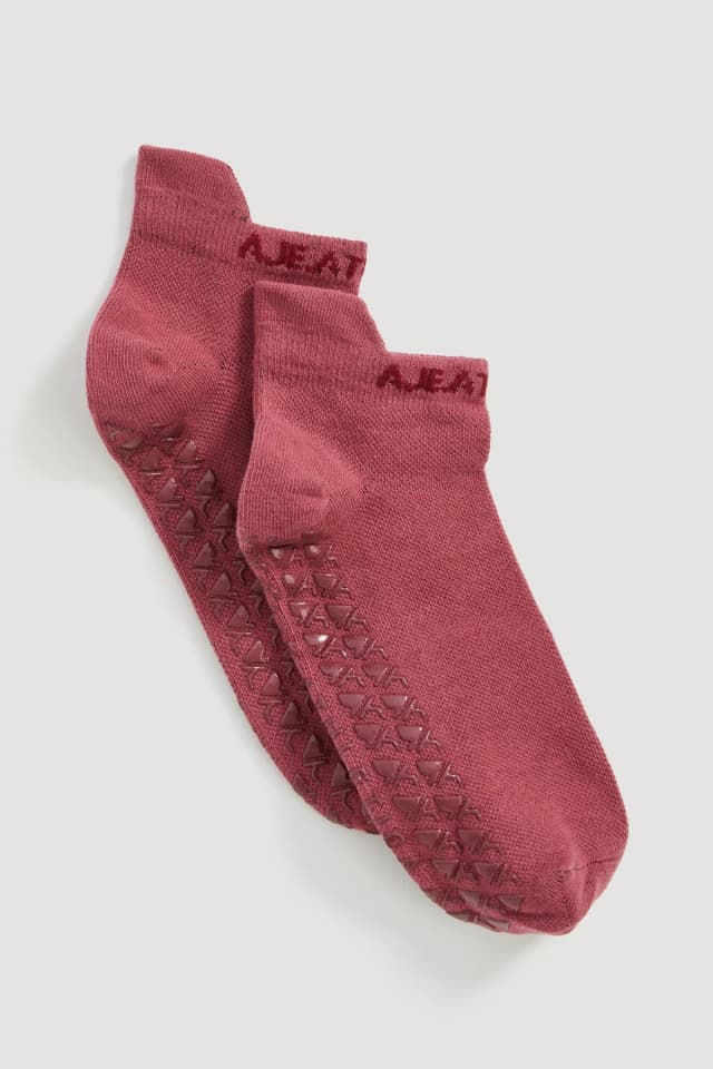 Athletica Logo Grip Socks in LIGHT PINK, image 1 of 1 from Aje