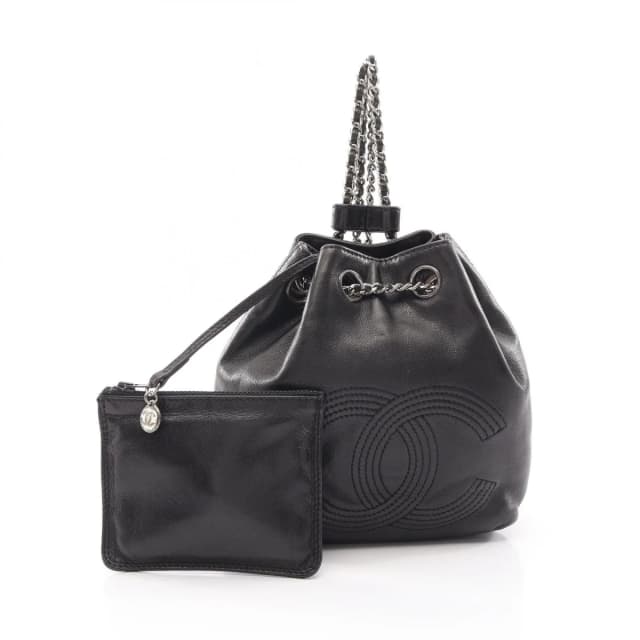 Chanel Backpack CC Logo Small Drawstring Black Lambskin CC Chain in Black Lambskin from The Reluxe, photo 1 of 1