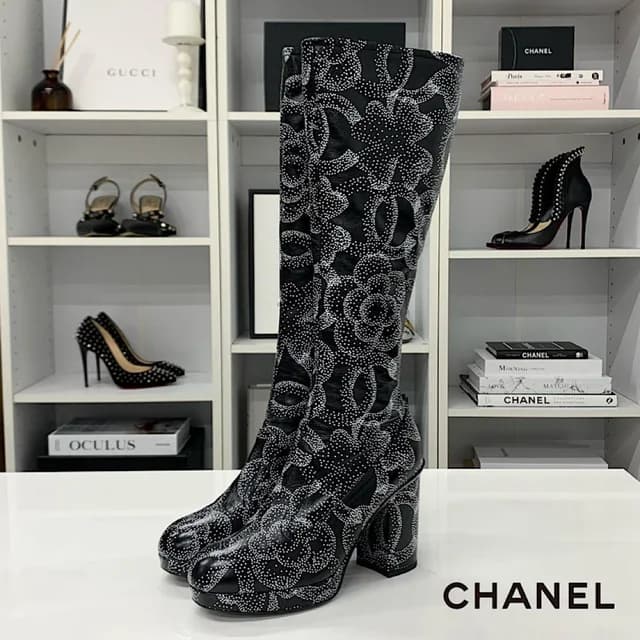 Chanel Calfskin CC Logo Camellia Clover Heart Charm Boots in Calfskin from The Reluxe, photo 1 of 1