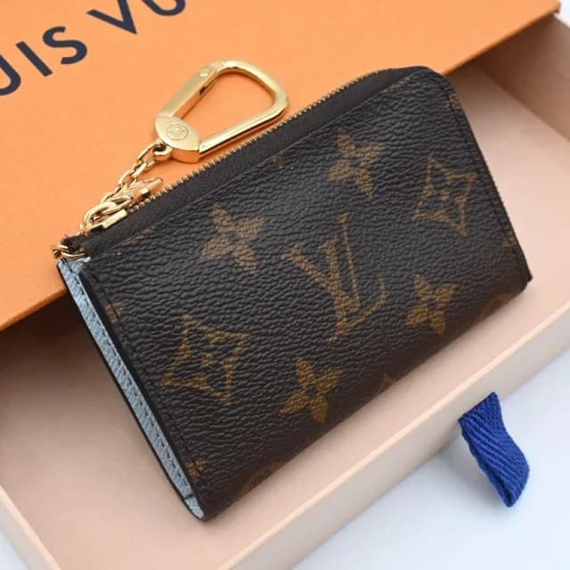 Louis Vuitton Monogram Porte Cles Noah Coin Purse Key Case Brown in Brown from The Reluxe, photo 1 of 1