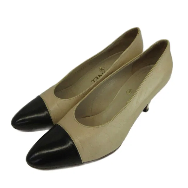 Chanel Pumps Leather Cap Toe Middle Heels Bicolor Beige Black in Black Leather from The Reluxe, photo 1 of 1