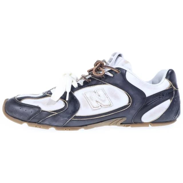 Miu Miu New Balance Leather Low-Top Sneakers Black White in Black Leather from The Reluxe, photo 1 of 1