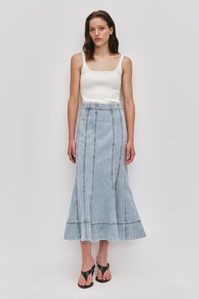 AJE Tia Denim Midi Skirt in LIGHT WASH BLUE, image 1 of 1 from Aje