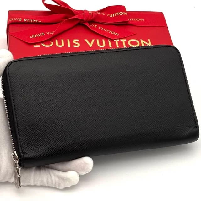 Louis Vuitton Wallet Taiga Zippy Organizer NM Black in Black from The Reluxe, photo 1 of 1