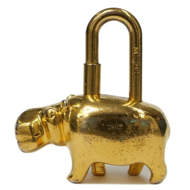 Hermès Cadena Cabas Limited Gold Annee Des Fleuves Lock Charm Keychain in Gold from The Reluxe, photo 1 of 1