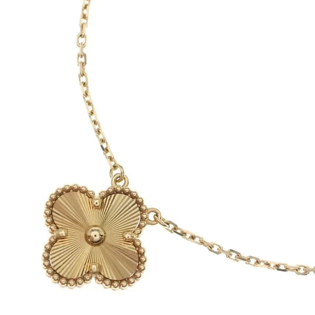 Van Cleef & Arpels Vintage Alhambra Guilloche Necklace Yellow Gold in Yellow from The Reluxe, photo 1 of 1