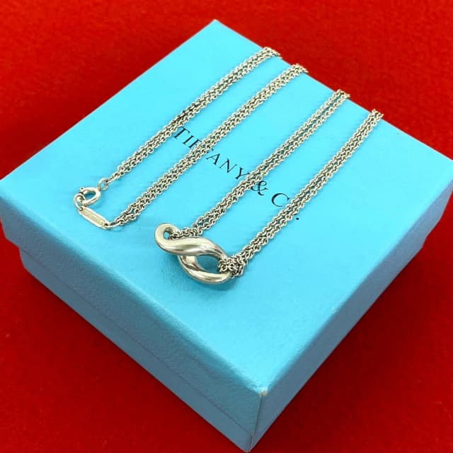 Tiffany & Co. Vintage Infinity Necklace 925 Sterling Silver Pendant in Silver from The Reluxe, photo 1 of 1
