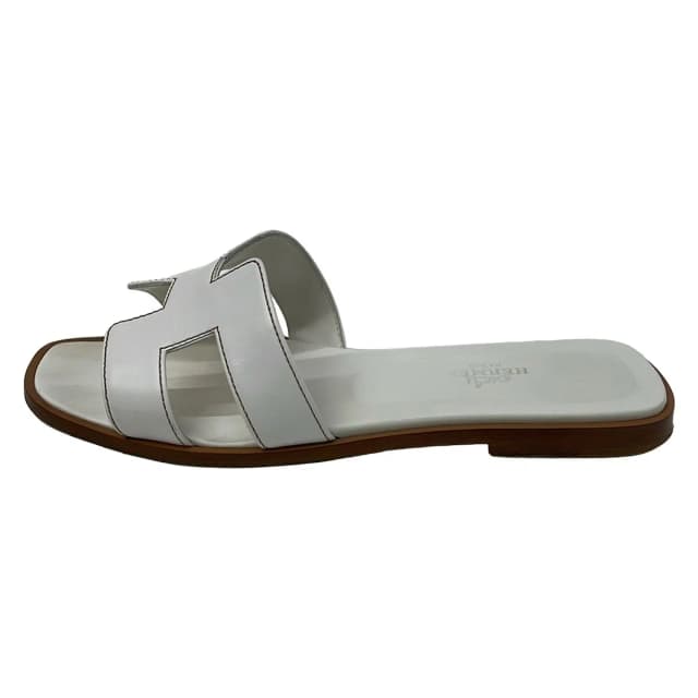 Hermès Mules Oran White Leather in White Leather from The Reluxe, photo 1 of 1
