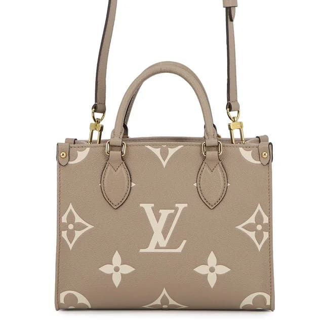 Louis Vuitton Monogram Empreinte On The Go PM Bicolor Tote 2-Way Shoulder Bag from The Reluxe, photo 1 of 1
