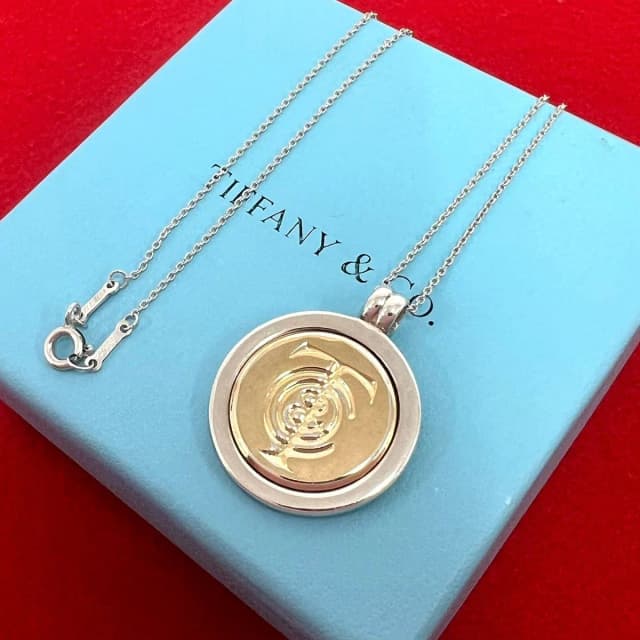 Tiffany & Co. Coin Necklace Silver Yellow Gold in Yellow from The Reluxe, photo 1 of 1
