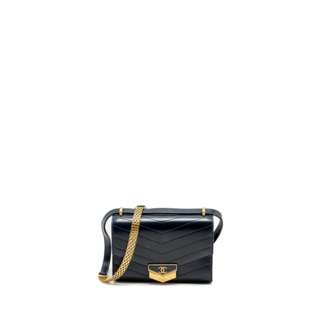 Chanel Lock me Up Chevron Medal Flap Bag Calfskin Dark Navy GHW in Navy Calfskin from EMIER, photo 1 of 1