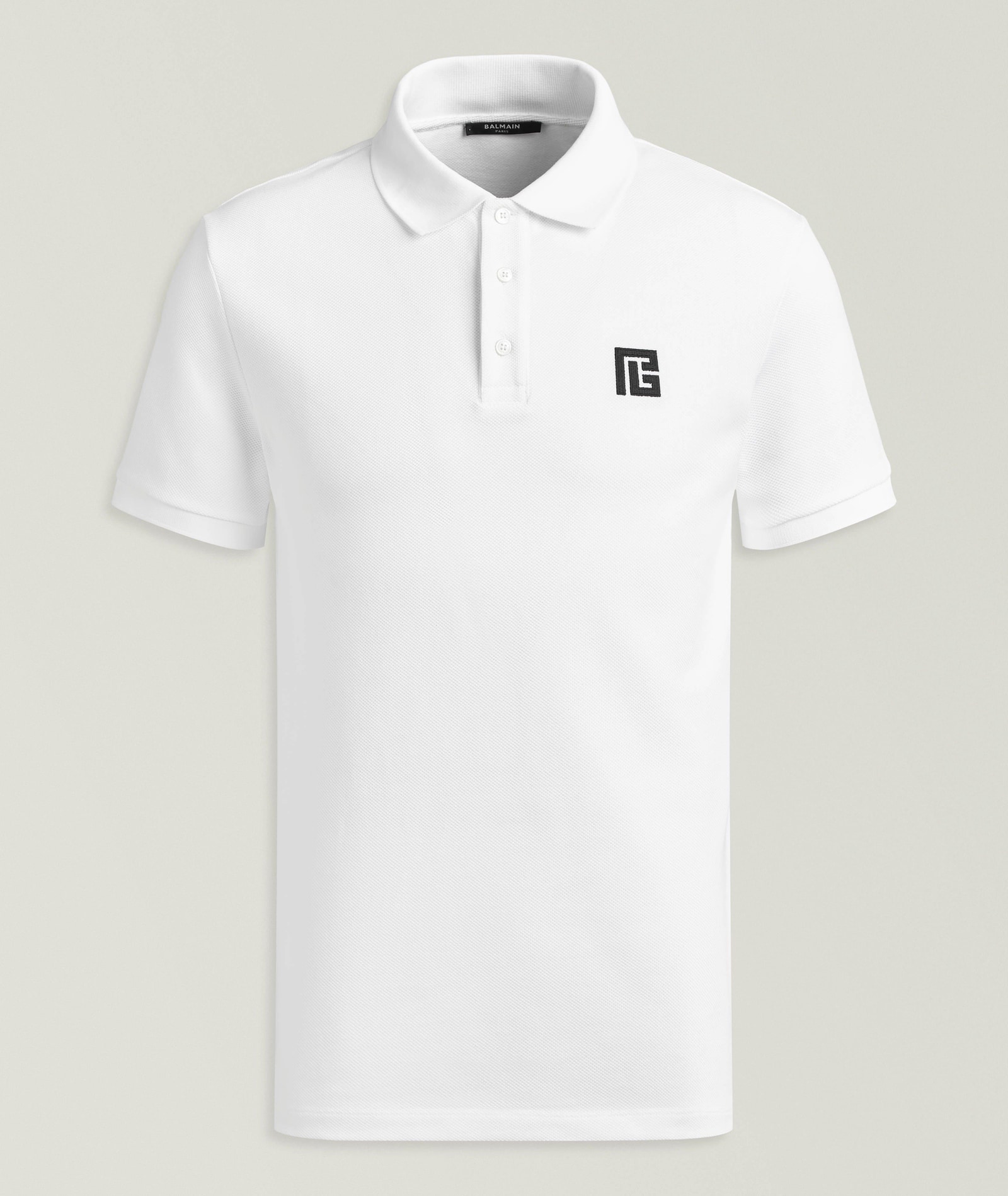 Balmain Embroidered Logo Cotton Piqué Polo in White Cotton & Cotton Blends, image 1 of 1 from Harry Rosen