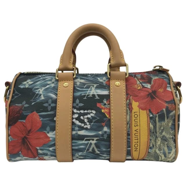 Louis Vuitton Keepall Bandouliere 25 Surfing Monogram Navy Blue in Navy Coated canvas from The Reluxe, photo 1 of 1