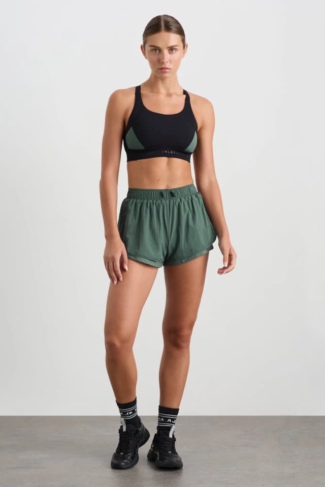 Athletica Perforated Spray Shorts 019 in MOSS GREEN, image 1 of 1 from Aje