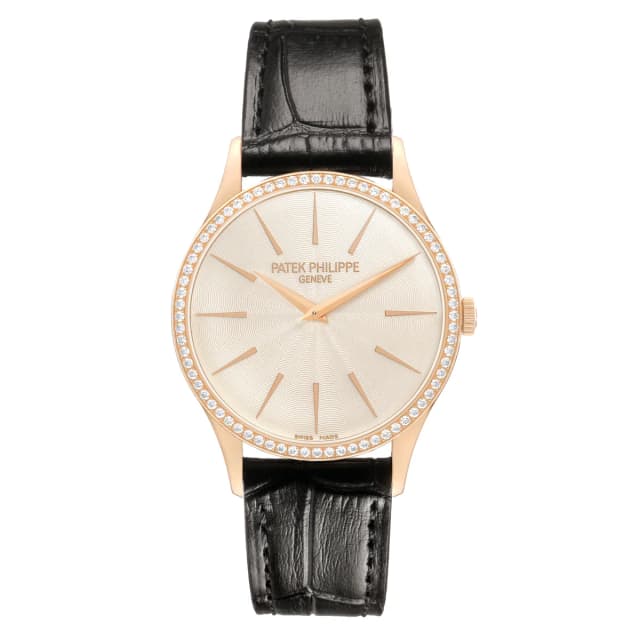 Patek Philippe Calatrava (Reference 4897R-010). A 33mm rose gold diamond-set manual wind wristwatch. 2013 in Pink Crocodile from Sotheby's, photo 1 of 1