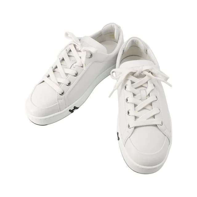 Hermès Sneakers Kid Leather Shoes White Black in Black Leather from The Reluxe, photo 1 of 1