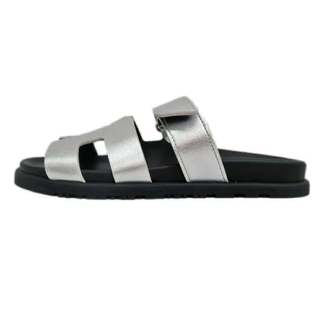 Hermès Chypre Sandals Silver Black Shoes 37.5 in Black Leather from The Reluxe, photo 1 of 1