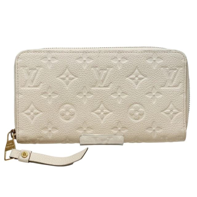 Louis Vuitton Portefeuille Secret Long Monogram Empreinte Bifold Wallet from The Reluxe, photo 1 of 1
