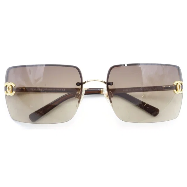 Chanel CC Logo Sunglasses Rimless Brown Gold Eyewear in Brown from The Reluxe, photo 1 of 1
