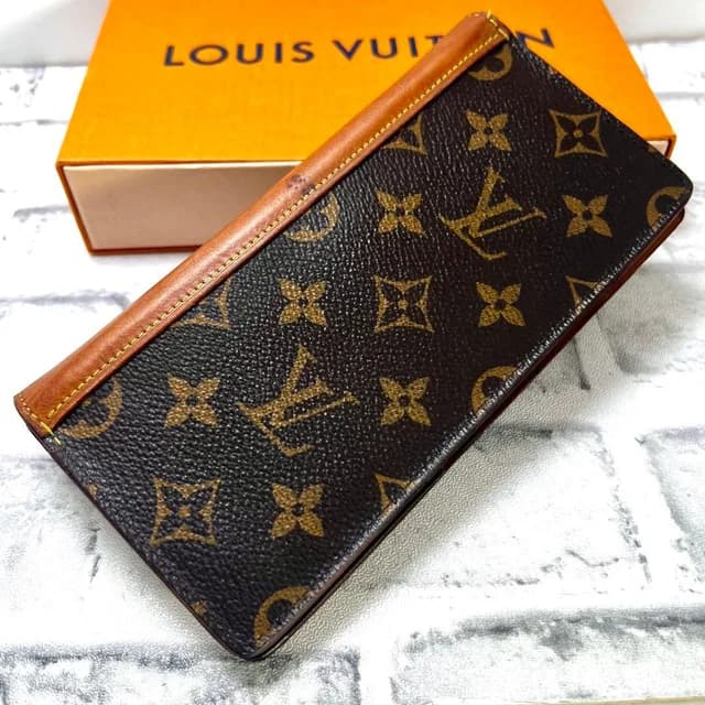 Louis Vuitton Monogram Portefeuille Plaza NM Wallet from The Reluxe, photo 1 of 1