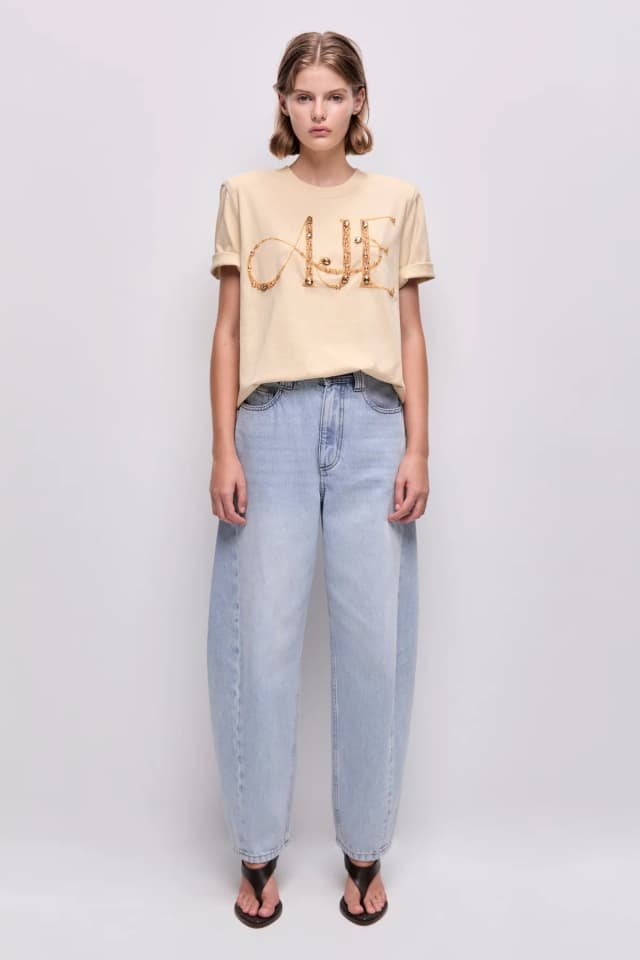 AJE Marietta Logo Tee in SANDSHELL/GOLD, image 1 of 1 from Aje