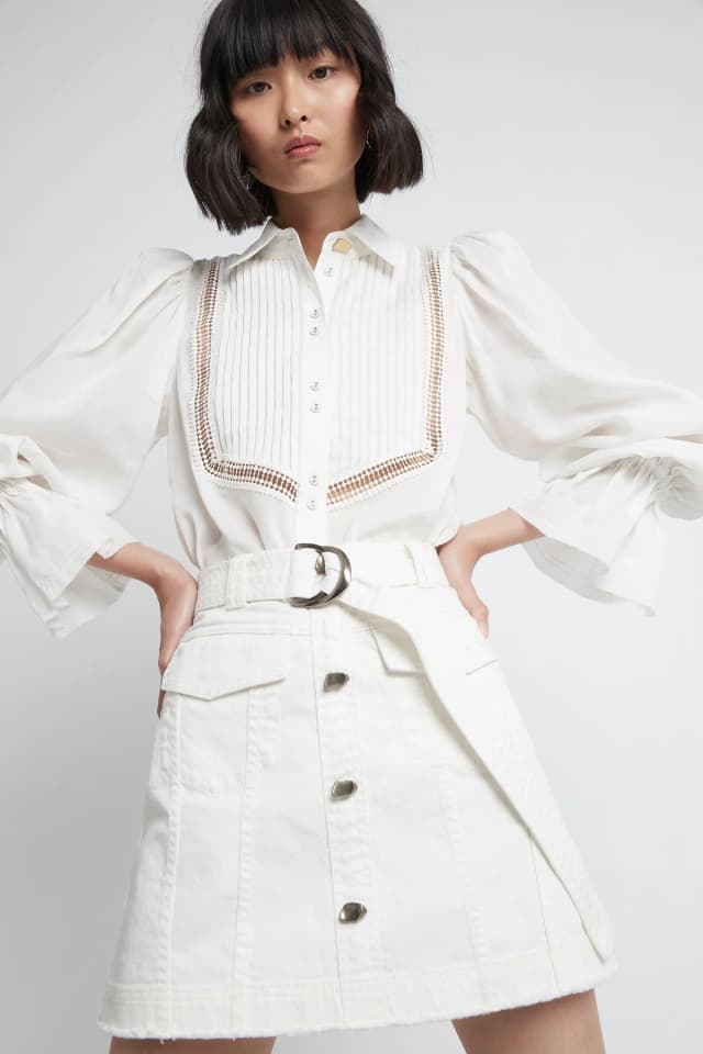 AJE Arlow Denim Mini Skirt in WHITE, image 1 of 1 from Aje