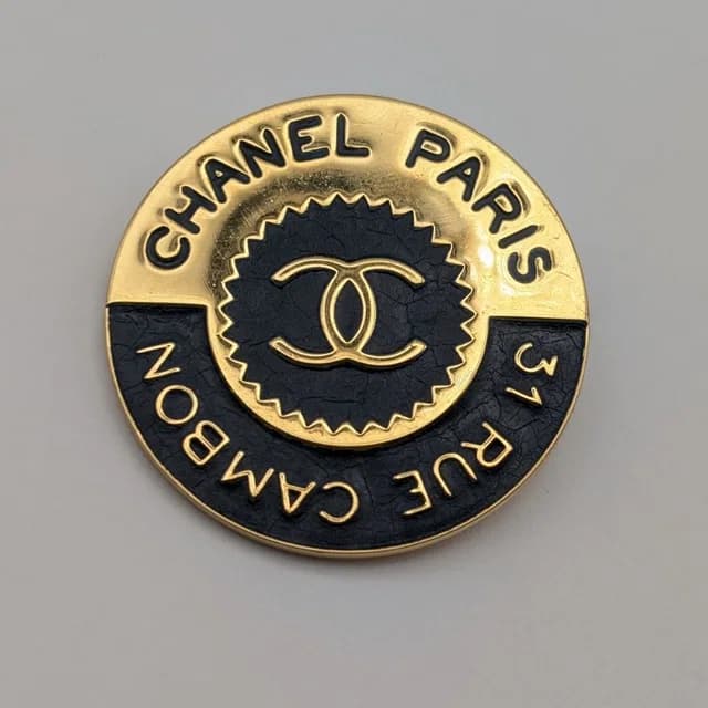 Chanel Brooch CC Logo Cambon Gold Black First Era Vintage in Black from The Reluxe, photo 1 of 1