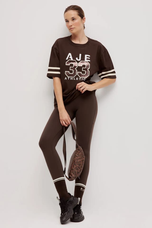 Athletica Wild Varsity Tee 102 in CHOCOLATE, image 1 of 1 from Aje