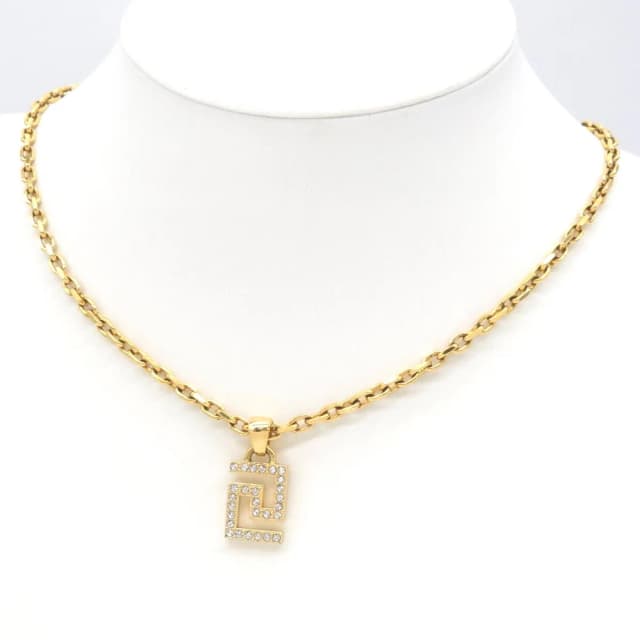 Versace Greca Pendant Crystal Medusa Charm Gold Tone Metal in Gold from The Reluxe, photo 1 of 1