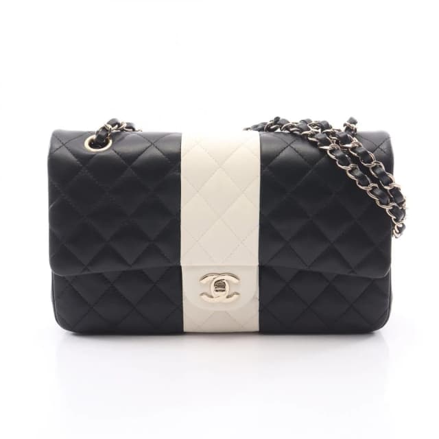 Chanel Shoulder Bag Quilted Double Flap Black White Lambskin Bicolor Chain in Black Lambskin from The Reluxe, photo 1 of 1